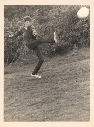 Boy KIcking a Ball, Summerhill School, England