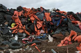 Some of the Tens of Thousands of Lifejackets in the Landfill near Molyvos. Lesbos, Greece, March 15, 2016. From the series Surviving Refuge.