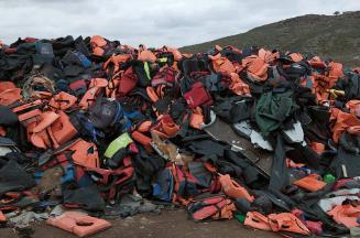 Some of the Tens of Thousands of Lifejackets in the Landfill near Molyvos. Lesbos, Greece, March 15, 2016. From the series Surviving Refuge.