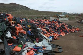 Some of the Tens of Thousands of Lifejackets in the Landfill near Molyvos. Lesbos, Greece, March 15, 2016. From the series Surviving Refuge.