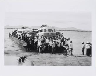 Loading the river ferry, Vietnam