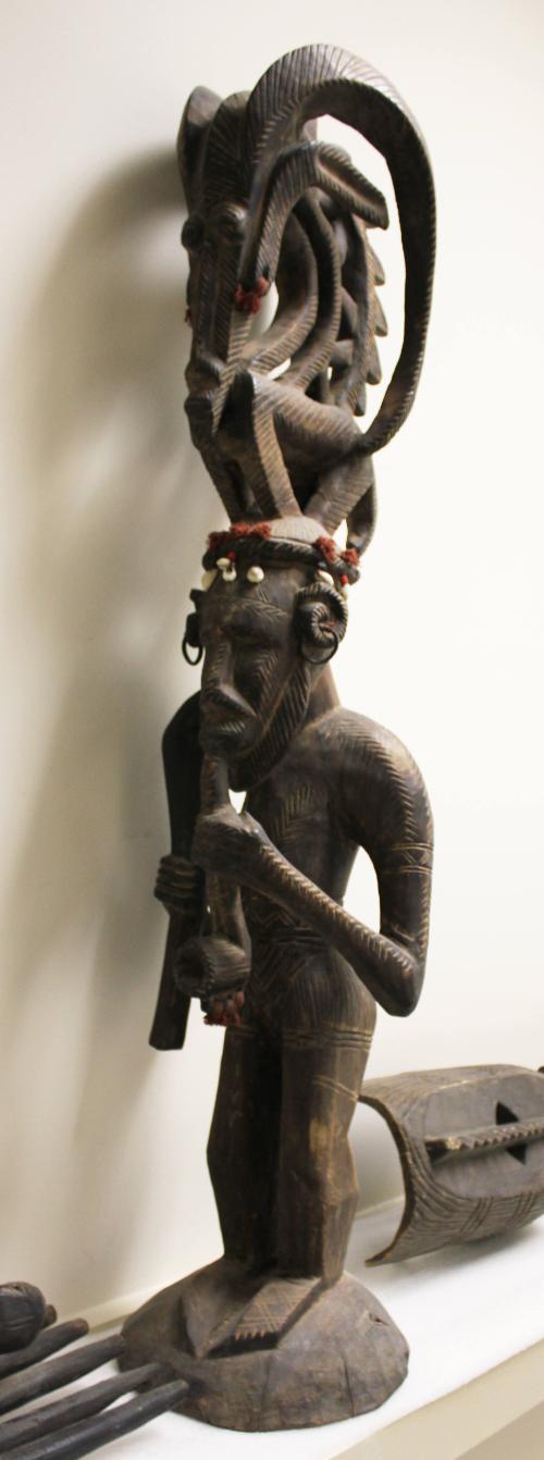 Standing Male Figure with Pipe and Chi Wara Headdress