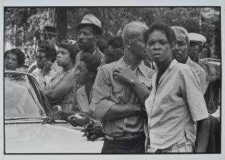 Birmingham, Alabama from the series Memories of the Southern Civil Rights Movement 
Crowds wait along the funeral route of the girls murdered in the 16th Street Baptist Church bombing.