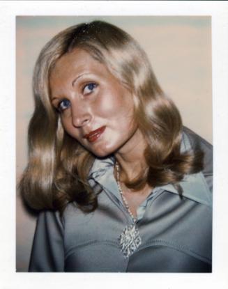 Unidentified Woman [young blond in blue polyester blazer]