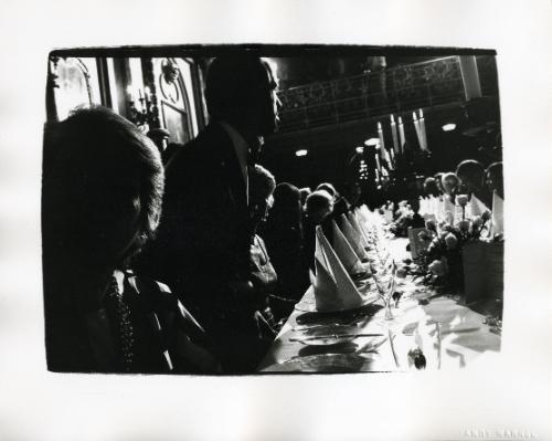 People Seated at Dinner Party