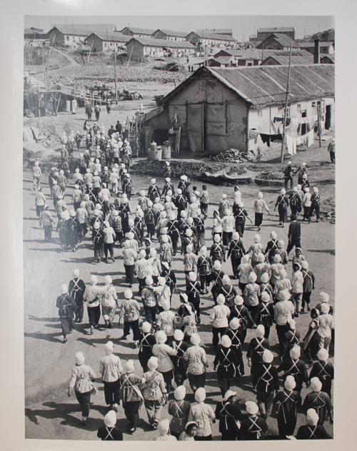 Lunch break for textile workers, China; Two more textile factories are planned for this town