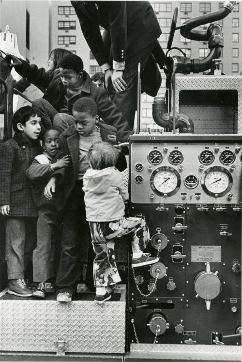 Children Climbing on a Fire Engine, New York City, USA