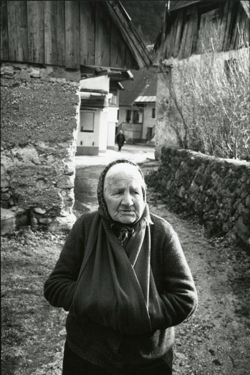 Elderly Woman Walking in Street, Slovenia