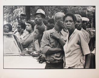 Birmingham, Alabama from the series Memories of the Southern Civil Rights Movement 
Crowds wait along the funeral route of the girls murdered in the 16th Street Baptist Church bombing.