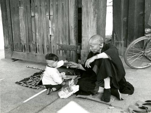 Japan [Seated man and child]