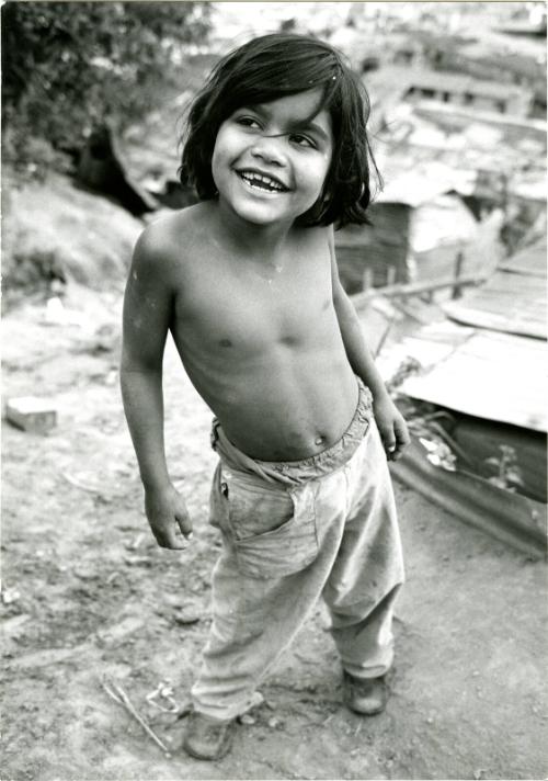 [Topless boy smiling, Venezuela]