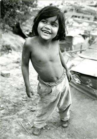 [Topless boy smiling, Venezuela]