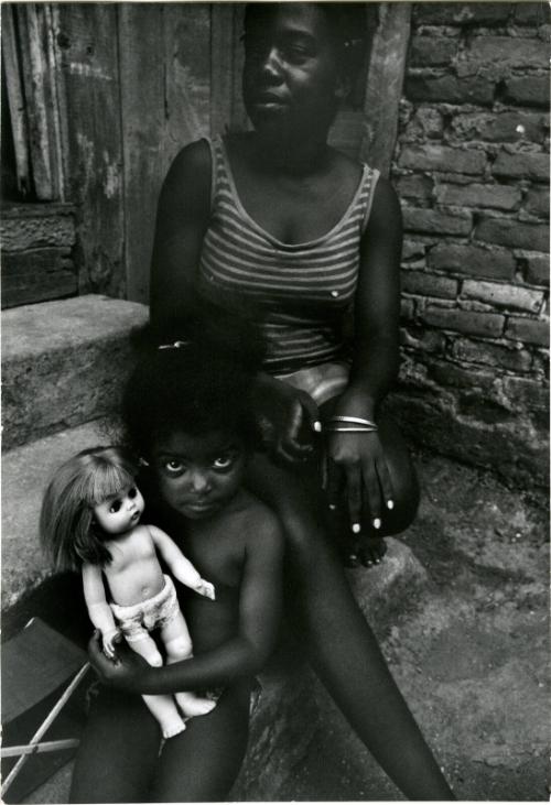 [Black mother and child with white doll, Brazil]