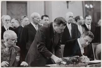 Officials signing documents, Poland