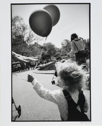 Child with a balloon, New York
