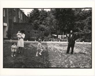 Jewish family in backyard, London