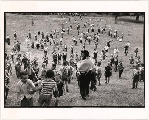 Crowd of Hassidic children in a field, New York City