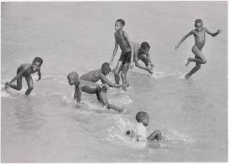 Children playing in water, Nigeria