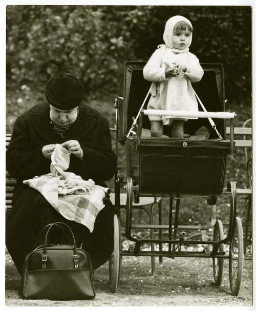 Child in a baby carriage, Paris