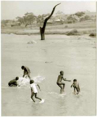 Children playing in water, Nigeria