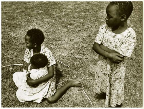 Children on the grass, Kenya