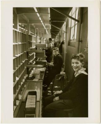 Teenagers working in post office, Amsterdam