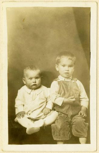 Two brothers seated