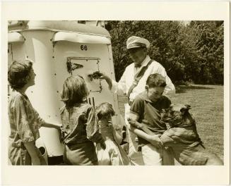 Ice cream man with customers, Greenwich, Connecticut