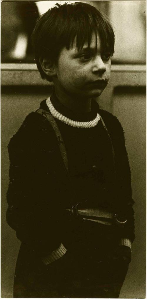 Boy in suspenders, Italy