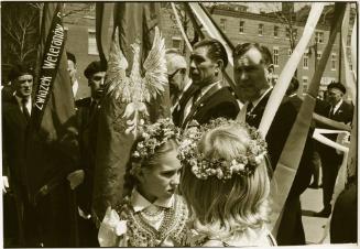 Polish girls wearing flower crowns in parade, Quebec