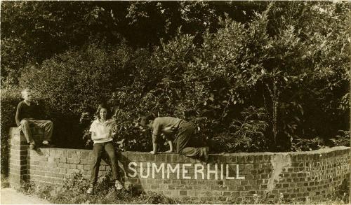 Children on Brick Wall, including Miki Cudihy Who Wrote a Book on her Summerhill School Experiences, Summerhill School, England