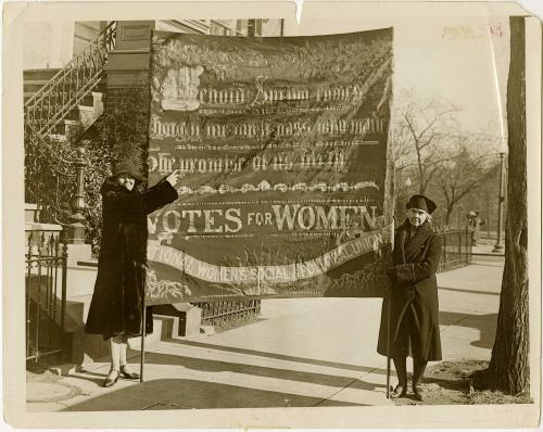 Christabel Parkhurst (Left) Noted Pre-War Suffragist Agitator, Unfurls the Banner Carried by Her Militant Legions in Their Campaign in England