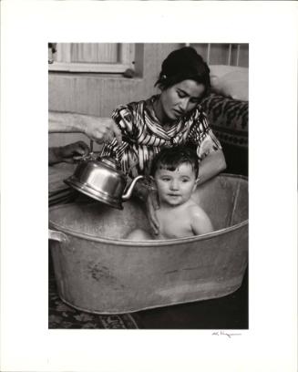 The bath with warm water from a teakettle in Tashkent, U.S.S.R.