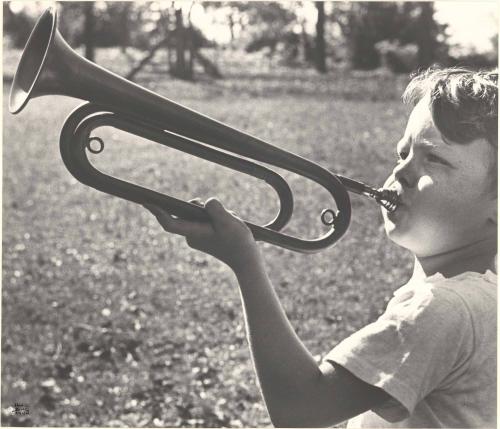 Boy playing bugle