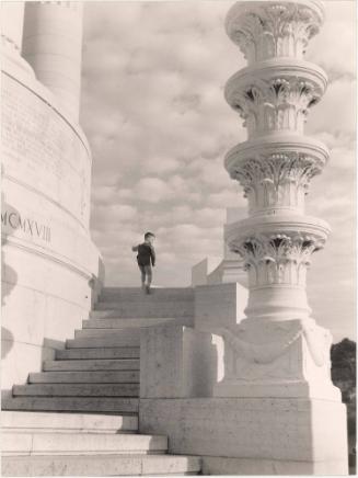 Boy going up on monument, Italy