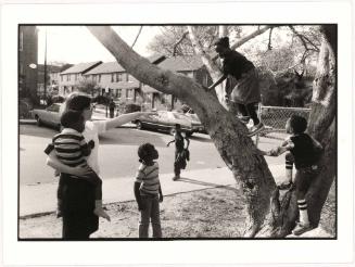 A Salvation Army Volunteer Picks Up Children in the Techwood Area to Escort Them to Church, Atlanta, Georgia