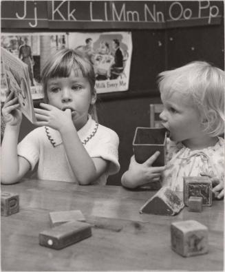 Two girls at a nursery school