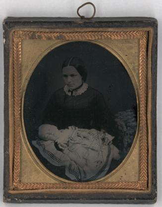 Woman Holding Dead Child