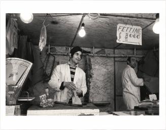 Butcher at the open-air market, Rome