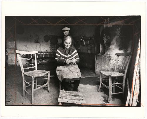 [Elderly woman knitting at home, Sicily, Italy]