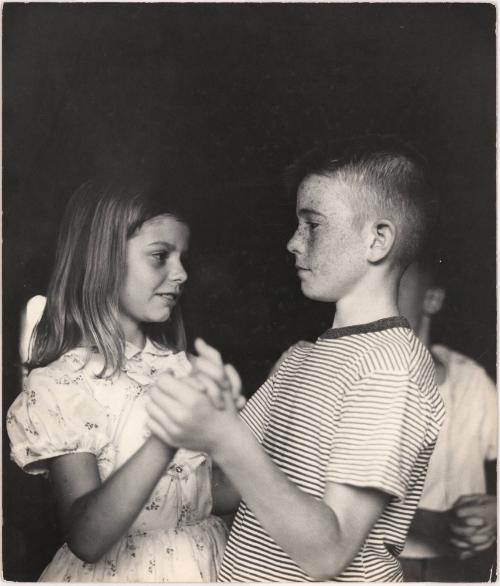 Portrait of boy and girl dancing